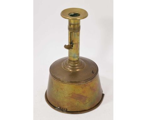 Early 19th century sheet brass combination slide ejection tinderbox candlestick, with hinged base, 20cm high. Provenance: The