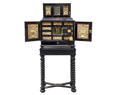 Fine and rare 17th century Flemish ebonised cabinet on later stand, the cabinet with rising caddy top enclosing small compart