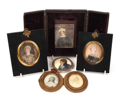 Two 18th century oval portrait miniatures on ivory - a woman with blue sash and a gentleman in profile, named in pen to the r