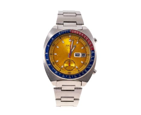 1970s Seiko Chronograph Automatic wristwatch, with circular yellow dial, day and date aperture, subsidiary seconds, red and b