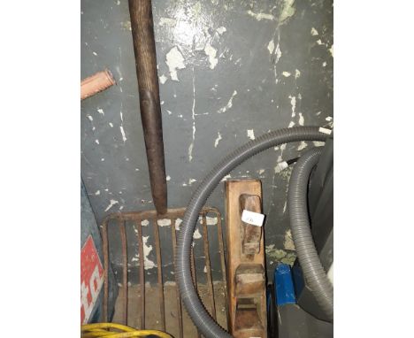 A vintage plane and a garden fork 