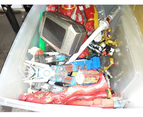 A large box of toys including action figures and light sabre 