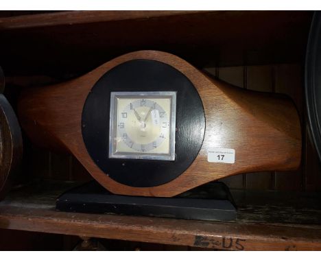 An eight day mantle clock formed from a propellar 