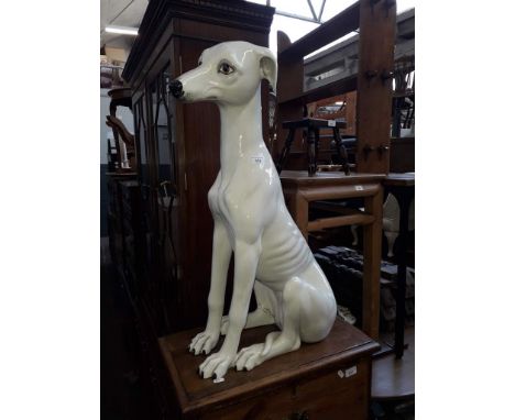 A large ceramic greyhound dog, 78cm high 