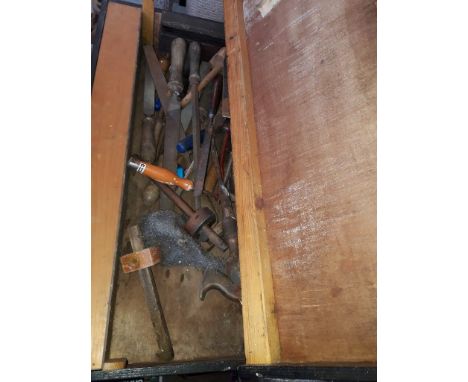 A joiners toolbox with woodworking tools 