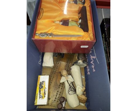 A box of collectables including a 1950's 'Robin cigarettes' cribbage board, two boxed Dinky toys, three Willow tree figures a