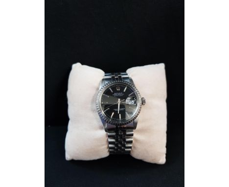 1980'S ROLEX OYSTER PERPETUL DATEJUST WATCH WITH BLACK DIAL 16030.  COMES WITH ORIGINAL MANUAL AND IN A ROLEX BOX.  WATCH IS 