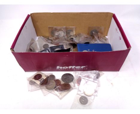 A box containing pre decimal British coinage, Britain's first decimal coin set, crowns etc  