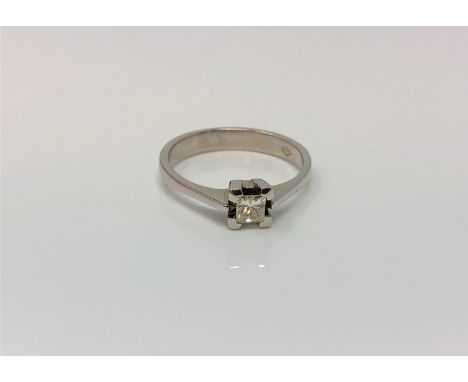 An 18ct white gold princess cut solitaire diamond ring, size M CONDITION REPORT: 2.9g