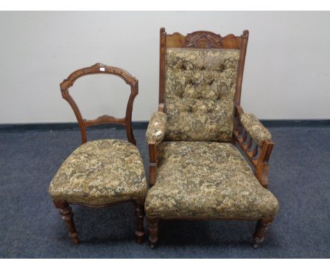 An Edwardian carved beech gentleman's armchair upholstered in tapestry fabric, together with an antique dining chair in the s