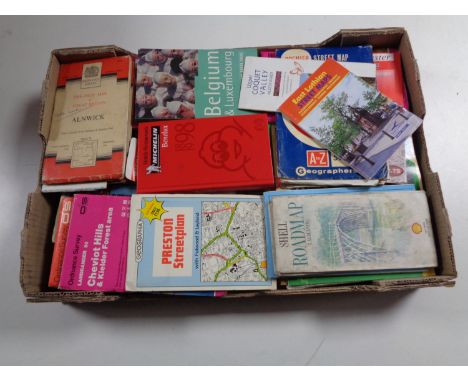 A box of Ordnance Survey and other road maps and guides 