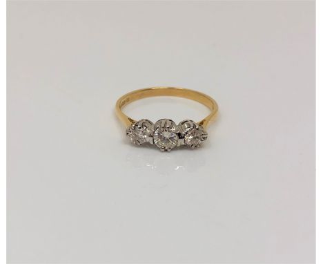 An 18ct gold three stone diamond ring, size N CONDITION REPORT: 2.2g