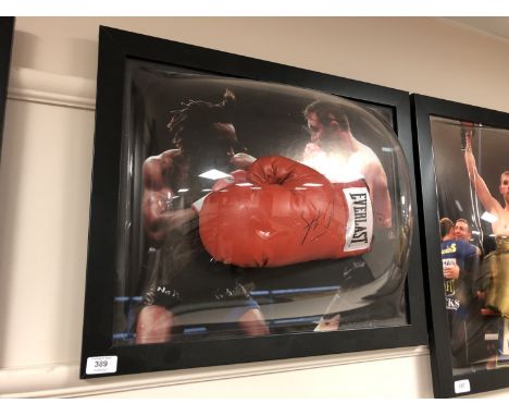A sporting memorabilia montage : A signed red Everlast boxing glove, Steve Collins, with certificate of authenticity from Mon