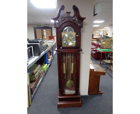 A contemporary Windsor 31 day longcase clock with brass and silver dial 