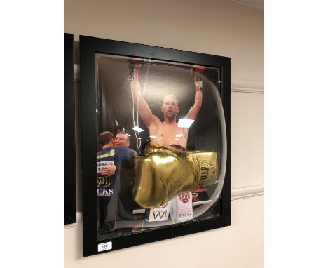 A sporting memorabilia montage : A signed gold VIP boxing glove, Billy Joe Saunders, with certificate of authenticity from Mo