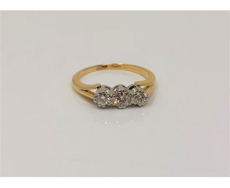 An antique 18ct gold platinum three stone diamond ring, size I CONDITION REPORT: 2.7g