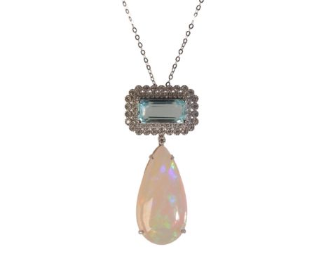 AN OPAL, AQUAMARINE AND DIAMOND PENDANT NECKLACEin 18ct white gold, the pendant set with a pear shape opal of 10.68 carats, a