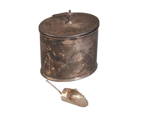 A GEORGE III SILVER TEA CADDY London 1779, of oval form, with cast finial sitting on a hinged lid decorated with floral motif