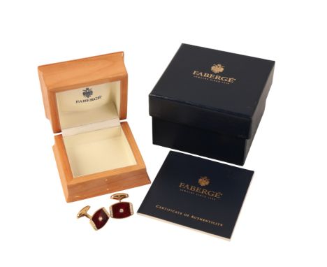 FABERGÉ: A PAIR OF LIMITED EDITION RED ENAMEL AND DIAMOND CUFFLINKSin 18ct gold, the tonneau shaped terminals set with red gu