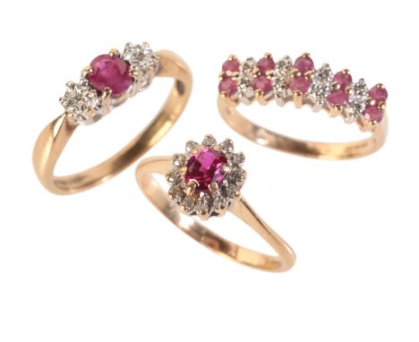 A COLLECTION OF RUBY AND DIAMOND RINGSin 9ct yellow and white gold, including a ruby and diamond cluster ring; a three stone 