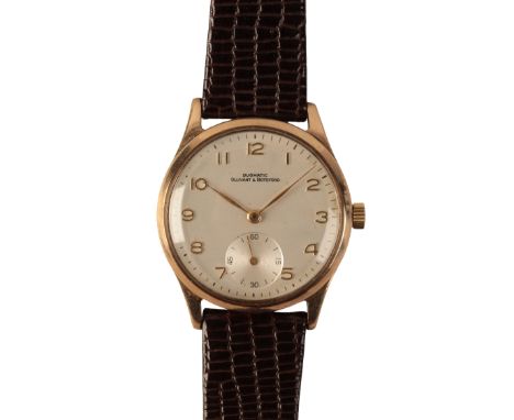 OLLIVANT & BOTSFORD DUOMATIC: A GENTLEMAN'S 9CT GOLD WRISTWATCHwith manual wind movement, the silver dial with subsidiary sec