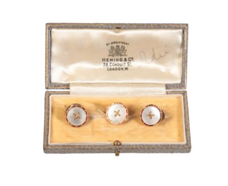 A SET OF VINTAGE MOTHER OF PEARL DRESS STUDSin 18ct gold, each designed as a button set with mother of pearl with gold stitch