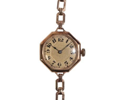 A LADY'S 14CT GOLD WRISTWATCHwith manual wind movement, the gold dial with black Arabic numerals and dark blue steel hands, n