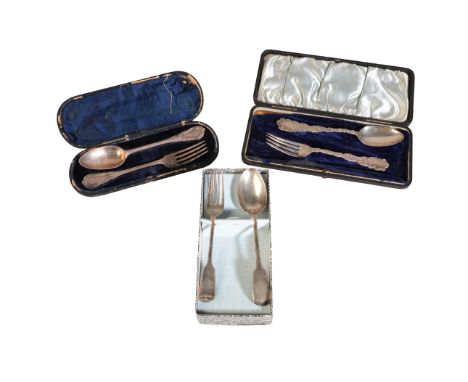 A VICTORIAN SILVER CHRISTENING FORK AND SPOONby George Adams, London 1865, with leaf scroll terminals, 18cm long, contained i
