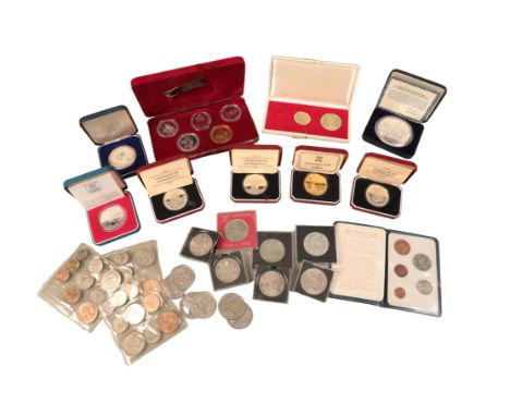 AN ELIZABETH II SILVER GILT MEDALLION: THE FIRST CONCORDE PASSENGERby Pobjoy Mint, and five proof coins, together with a box 