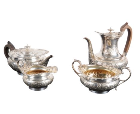 A LATE VICTORIAN SILVER FOUR PIECE TEA SERVICE&nbsp;by Elkington &amp; Co, London 1897, with putto, leaf scroll and gadrooned