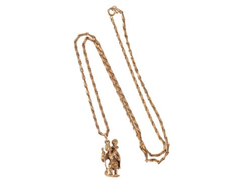 A VINTAGE ST. CHRISTOPHER PENDANT NECKLACEin 9ct yellow gold, the pendant suspended from a fancy link chain, full British hal