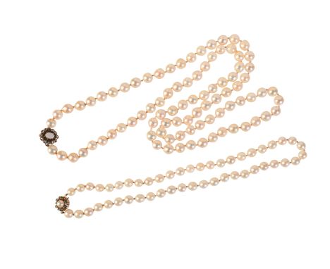 TWO PEARL NECKLACESincluding a pearl necklace comprising a single row of 87 uniform cultured pearls of c.8.5mm, terminated by