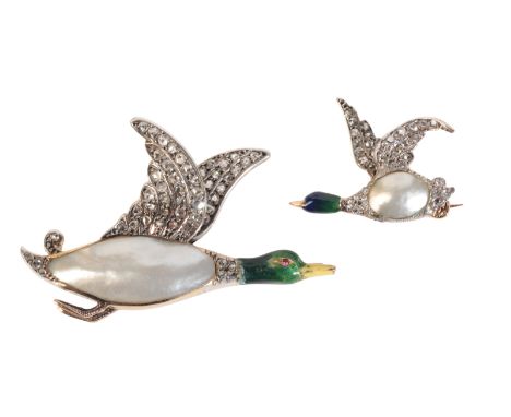 A PAIR OF ANTIQUE DIAMOND AND ENAMEL DUCK BROOCHESin 18ct gold and silver; both set with a blister pearl to the body, the win