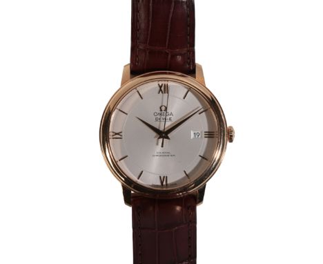 OMEGA DE VILLE: A GENTLEMAN'S 18CT GOLD WRISTWATCHwith co-axial chronometer movement, the silver dial with gold Roman and bat