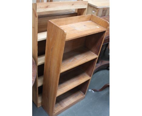 An elm bookshelf with three shelves, with an oak bookshelf, 49cmW x 99cmH and 58cmW x 93cmH with a pine four shelf bookshelf,