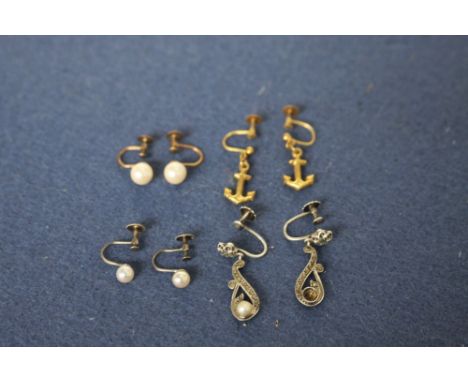 A pair of 9ct gold and pearl earrings, a pair of 9ct gold anchor earrings, a pair of silver and pearl earrings, and a pair of