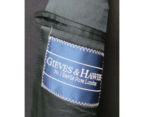A 'Gieves & Hawkes' Savile Row light weight wool double breasted blazer. The jacket has metal buttons to fasten and three eac