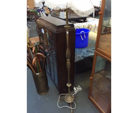 A Regency style brass standard lamp, leaf decoration on splayed base