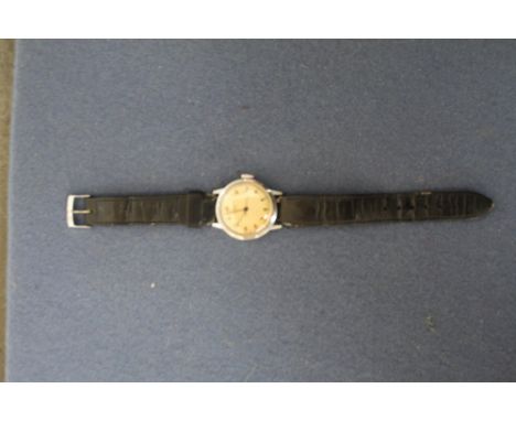 An Omega (circa 1944) chronograph, 30T2(?), Arabic numerals, on leather strap, the back reading modele + depose, 10224203