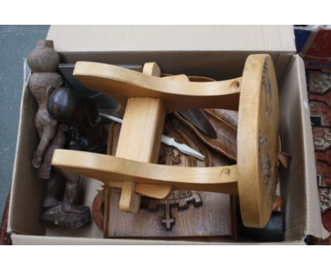 A mixed lot of wooden items including a stag carved stool, some African tribal carvings, carved wooden bowls and lidded bowls