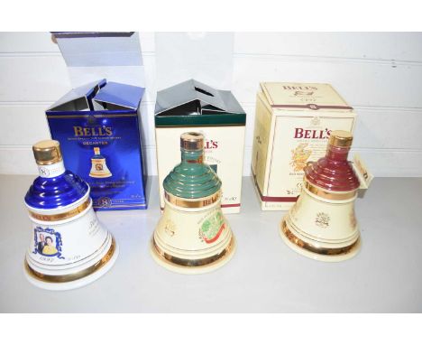 BELLS SCOTCH WHISKEY COMMEMORATIVE DECANTERS COMMEMORATING THE GOLDEN WEDDING ANNIVERSARY OF QUEEN ELIZABETH 11 AND THE DUKE 