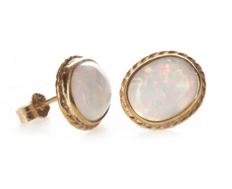 PAIR OF OPAL STUD EARRINGS, each set with a cabochon opal within a ropetwist border, in nine carat gold, 2g