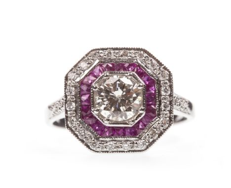 RUBY AND DIAMOND RING, the octagonal bezel set with a central round brilliant cut diamond of approximately 0.65 carats, borde