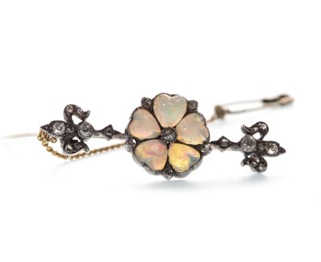 LATE NINETEENTH CENTURY OPAL AND DIAMOND BAR BROOCH, set with a central floral motif with heart shaped cabochon opals with di