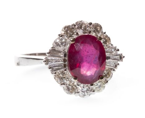 TREATED RUBY AND DIAMOND RING, the central oval faceted ruby 9mm long and within a diamond halo set with round brilliant cut 