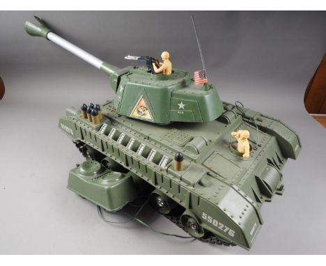 A De-Luxe Tiger Joe model tank, 15 1/2" high x 32" long, and a Subbuteo "Continental" table soccer set, in box 