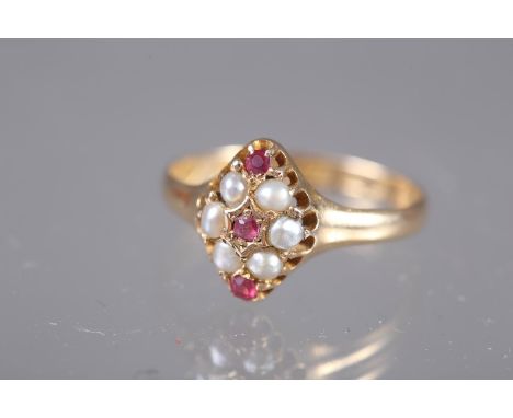 A 15ct gold ruby and seed pearl dress ring, size P, 2.1g 