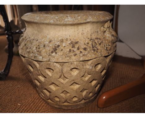 A cast stone planter/jar with scroll design, 16" dia 
