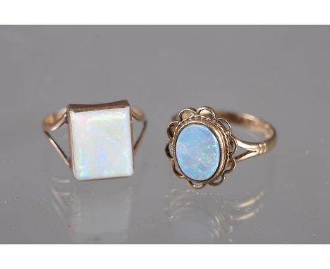 A 9ct gold dress ring set single square cut opal, size M, 2.1g, and another set oval opal, size L, 2.6g 