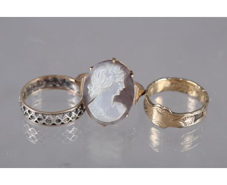 A 9ct gold and carved mother-of-pearl cameo ring, size R, 3.6g, a 9ct gold and woven hair mourning ring, size O, 1.8g, and a 